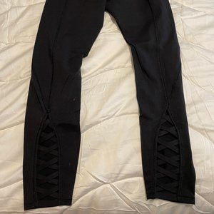 Lululemon Athletica Black Crop Leggings with criss cross leg back details Size 8
